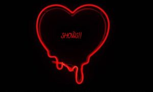 A Red Color Heart With a Black Background